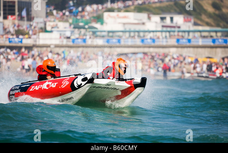 Zap Cat race, watched by crowds of people on Bournemouth beach, Dorset. UK. Stock Photo