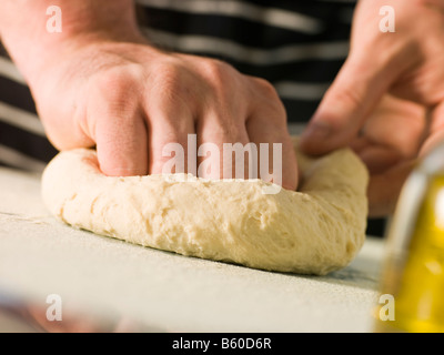 Kneading Pizza Dough Stock Photo