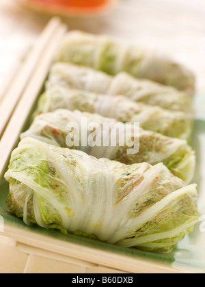 Steamed Pork and Vegetable Cabbage Rolls With Sweet Chili Sauce Stock Photo