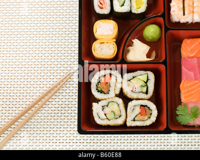 Japanese food bento box rice and fried salmon and vegetables with other  cuisine on table in garden at outdoor of Japan village in Ayutthaya, Thailand  Stock Photo - Alamy