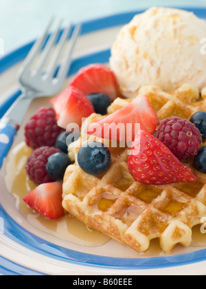 Sweet Waffles with Berries Ice Cream and Syrup Stock Photo