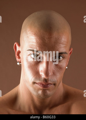 Bald-headed man, face, serious Stock Photo