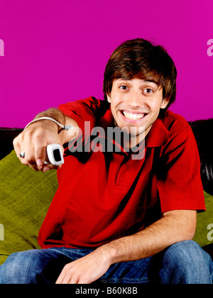 Young Man Playing On Wii Game Model Released Stock Photo