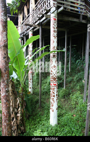 Decorated stilts of Orang Ulu house in Sarawak, Malaysia. Stock Photo