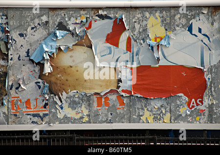 a torn advertising sign ripped in stoke on trent uk Stock Photo