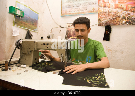 Tailor using a sewing machine, tailor shop, Sana, Yemen, Middle East Stock Photo