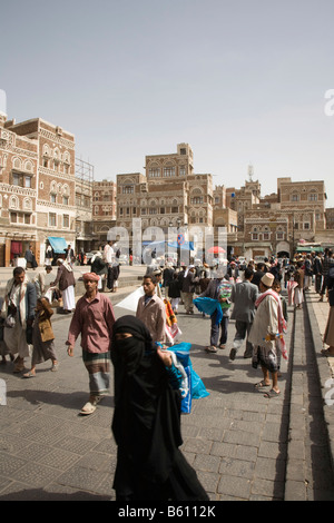 Souk, buildings made of brick clay, marketeers, square in front of the Bab El Yemen, Sana, UNESCO World Heritage Site, Yemen Stock Photo