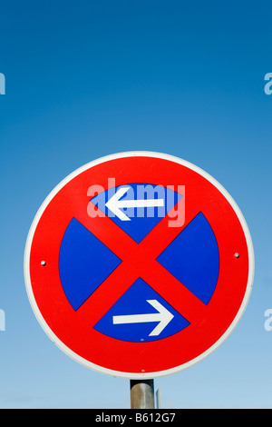 No Stopping and In Either Direction signs in city street Stock Photo ...