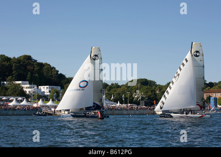 Catamarans, the British TeamOrigin and the Swiss Alinghi in the iShares Cup 2008, Kiel, Baltic Sea, Northern Germany, Europe Stock Photo