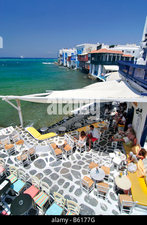 Bar located on the promenade along the port of Little Venice, tessellated stone floor, Mykonos Island, Cyclades, Greece, Europe Stock Photo