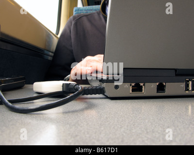 Working on the train, mobile internet Stock Photo