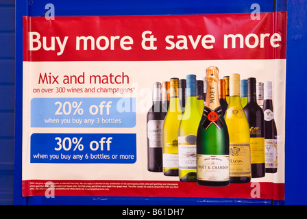 Sign advertising cheap alcohol offers on wine and champagne outside uk off license Stock Photo