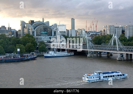 The River Thames and Charing Cross railway station in London England Stock Photo