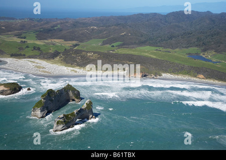 Archway Islands Wharariki Beach south of Cape Farewell NW Nelson Region South Island New Zealand aerial Stock Photo