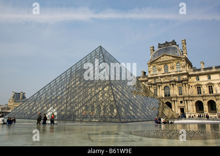 A view of the glass pyramid, designed by architect I.M. Pei, marking an entrance to the Musee du Louvre in Paris Stock Photo