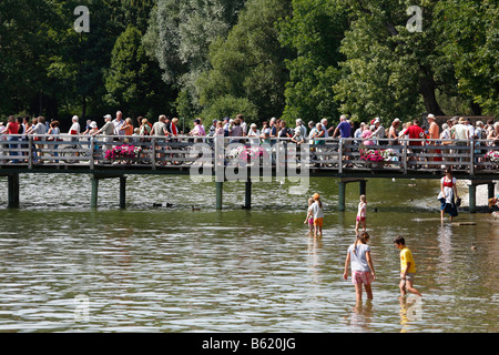 Steamer landing stage full of people in Herrsching on Lake Ammersee, Fuenfseenland, Upper Bavaria, Germany, Europe Stock Photo
