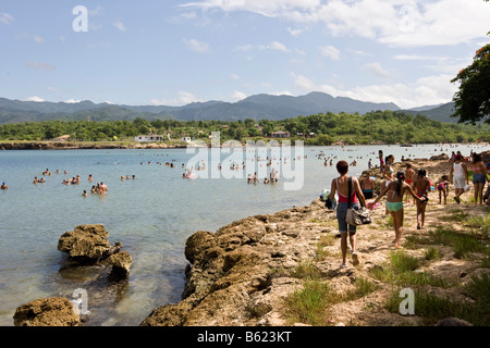 Cubans on a public beach near Trinidad, Cuba, Latin America Stock Photo