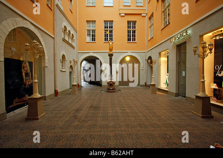 Modern shopping arcade with a Versace store in Riga, Latvia, Baltic states Stock Photo