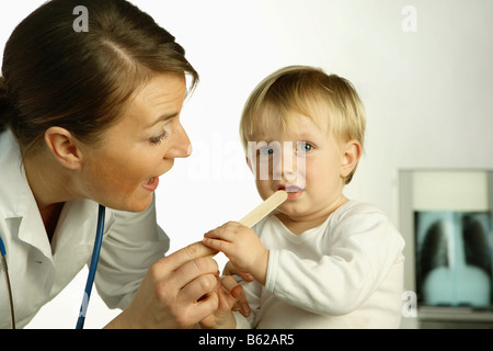 Female doctor, examination, small child Stock Photo