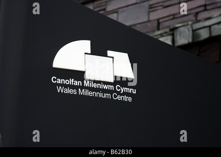 Black and white signboard on which Wales millennium centre is written in Cardiff Bay, Wales, United Kingdom Stock Photo