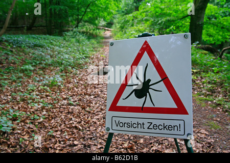 Sign, beware of ticks, hiking trail, dangerous ticks Stock Photo