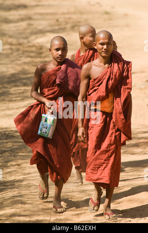 Young monks on a road, Bagan, Myanmar Stock Photo