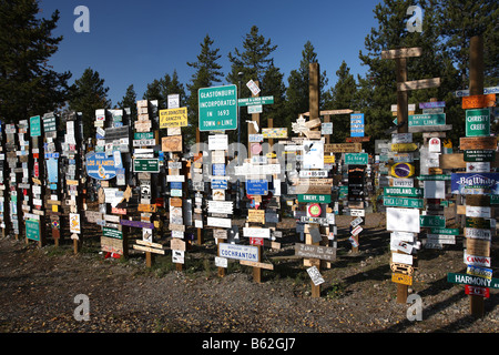 Sign posts forest in Watson Lake Yuko Stock Photo