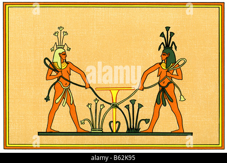 At left is Hapi, god of the Nile of the south (White Nile), and, at right, Hapi, god of the Nile of the north (Blue Nile). Stock Photo