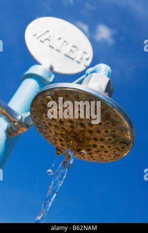 Low angle view of water dripping from a beach shower, Miami Beach, Florida, USA Stock Photo