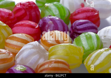 colorful hard sweets on white backround