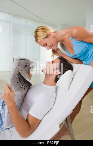 Mid adult woman smiling with a young man Stock Photo