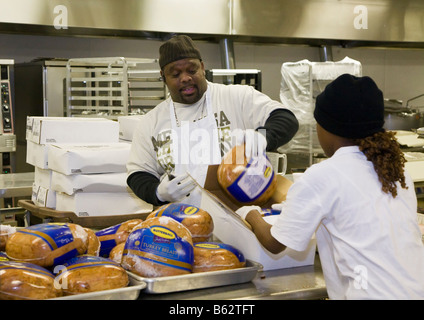 Workers Prepare Thanksgiving Dinner for Homebound Senior Citizens Stock Photo
