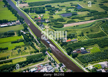 Netherlands Zuid Holland Kinderdijk Rotterdam Little canal in polder Aerial Stock Photo