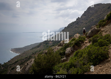 Hiker on hike from Sougia to Palechora. Stock Photo