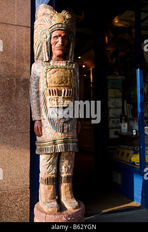 A Wooden Cigar Store Indian Outside A Tobacconist Shop Stock Photo