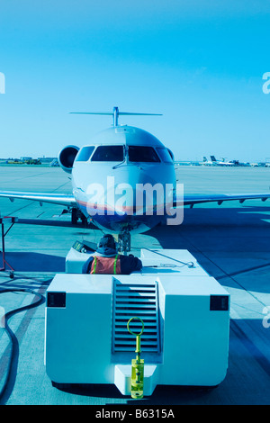 Airplane at an airport Stock Photo
