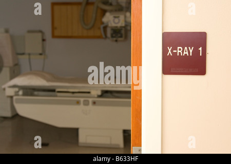 Xray room in a hospital with a sign outside the door. Stock Photo