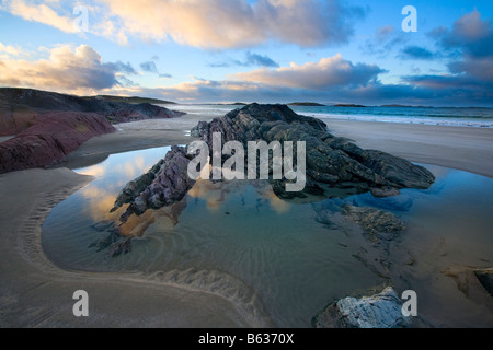 Evening rock pool on Glassillaun Beach, Connemara, County Galway, Ireland. Stock Photo