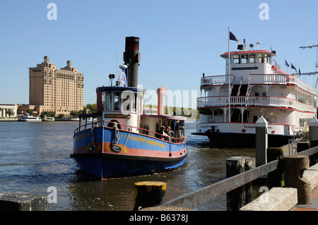 Savannah River Georgia America USA The free cross river ferry vessel the Juliette Gordon Low In the background the Westin hotel Stock Photo