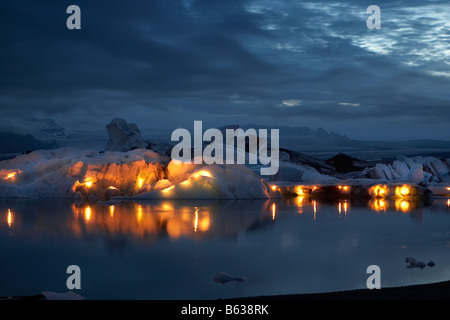 Candles on icebergs, Jokulsarlon Glacial Lagoon, Breidamerkurjokull glacier, Eastern Iceland Stock Photo