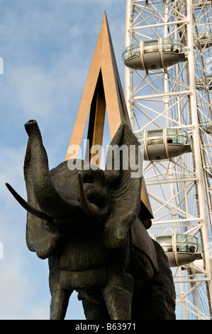 Space Elephant by Salvador Dalí with London Eye in the background, outside Dalí Universe, County Hall Gallery, London, UK Stock Photo