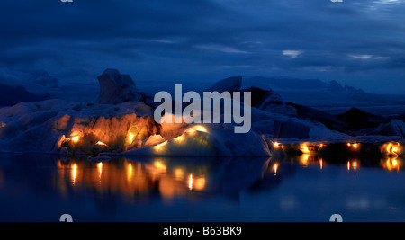 Candles on icebergs, Jokulsarlon Glacial Lagoon, Breidamerkurjokull glacier, Eastern Iceland Stock Photo