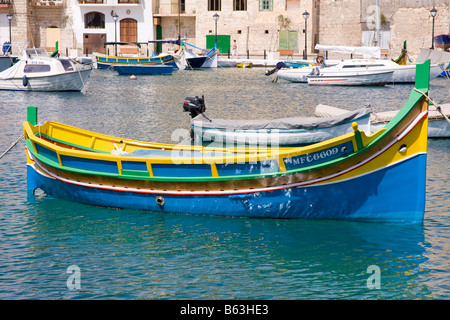Luzzu fishing boat moored in Saint Julian’s Harbour, Spinola Bay, Saint Julian’s, Malta Stock Photo