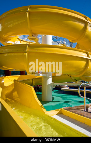 Yellow water slide on a cruise ship Stock Photo