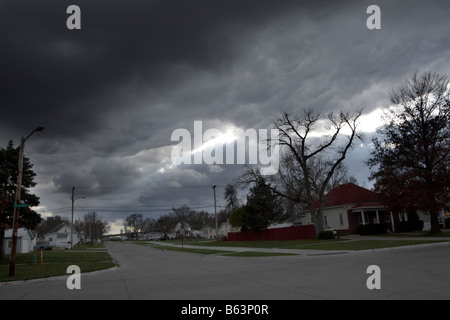 Winter thunderclouds over residential street neighborhood. Stock Photo