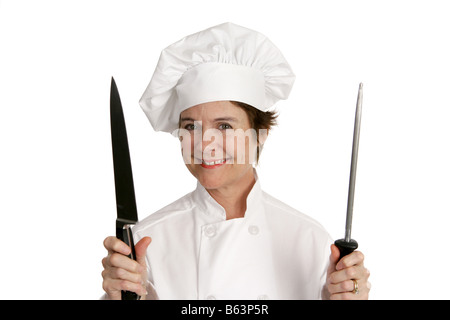 A pretty chef holding a large knife and a sharpener Isolated on white Stock Photo