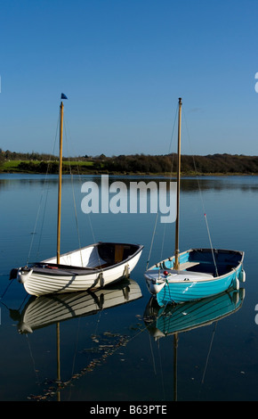 Landscape Reflection of Two Small Boats, Newtown Creek, Newtown, National Nature Reserve, Isle of Wight, England, UK, GB. Stock Photo