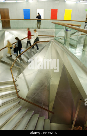 People coming down the stairs. Caixaforum Art Centre. Madrid. Spain. Stock Photo