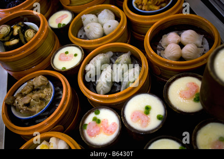 China, Shanghai,  Steamed dumplings or dim sum (in steamer baskets). Stock Photo