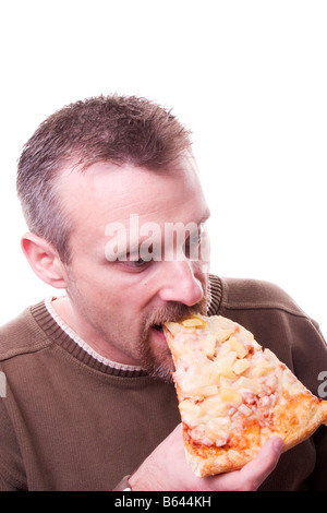 man eating pizza slice isolated on white in camera isolation Stock Photo